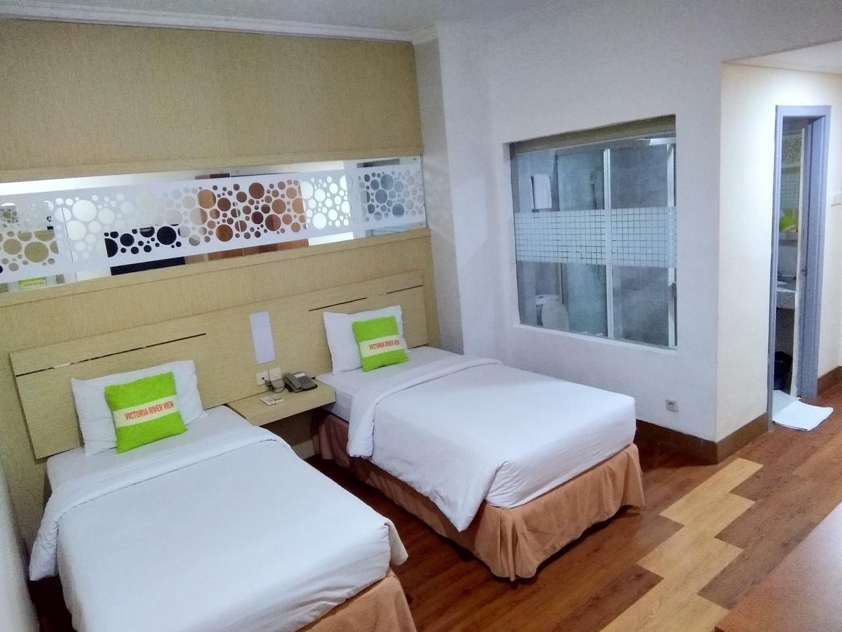 Hotel Victoria River View Banjarmasin  Esterno foto